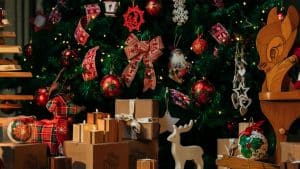 a christmas tree with presents under it