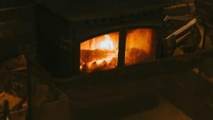 black fireplace near couch