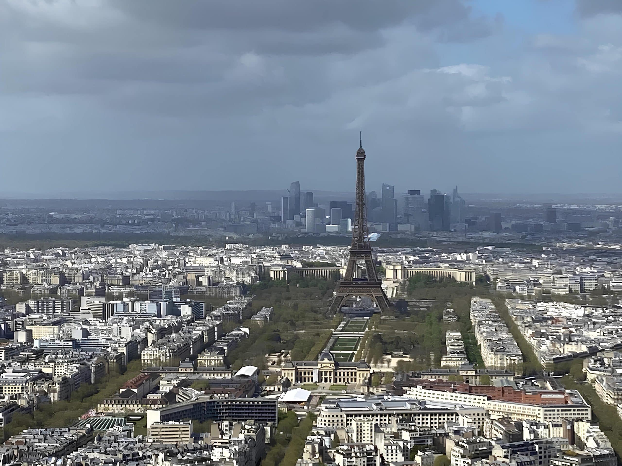 Paris rooftops, the Eiffel Tower and La Defense seen from the Montparnasse tower on the Left Bank