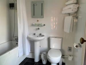 Modern shower bathroom in one of the recently refurbished Keats Green Hotel rooms