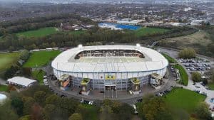 MKM Stadium under floodlights on a matchday in Hull
