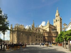 Seville Cathedral and the Giralda bell tower — the largest Gothic cathedral in the world, a five-minute walk from Center Suites San Eloy