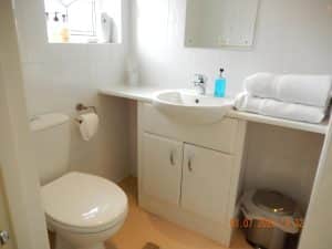 Bright en-suite bathroom at The Rutlands B&B with a walk-in shower and glass screen