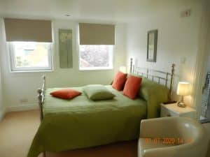 Deluxe Double Room at The Rutlands B&B with a double bed, flat-screen TV and en-suite walk-in shower