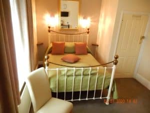 Immaculate en-suite double room at The Rutlands B&B with double bed and Victorian-inspired decor