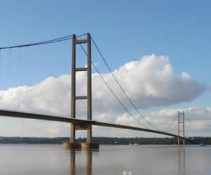 The Humber Bridge stretching across the estuary at dusk near Hull