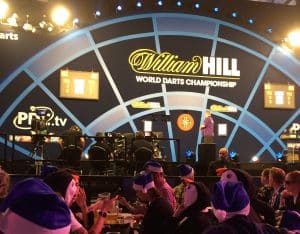 Fancy-dress crowd below the stage at the World Darts Championship inside Alexandra Palace