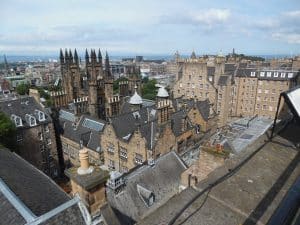 Edinburgh Old Town rooftops and spires seen from Castle Hill, the first Scottish city to charge a tourist tax