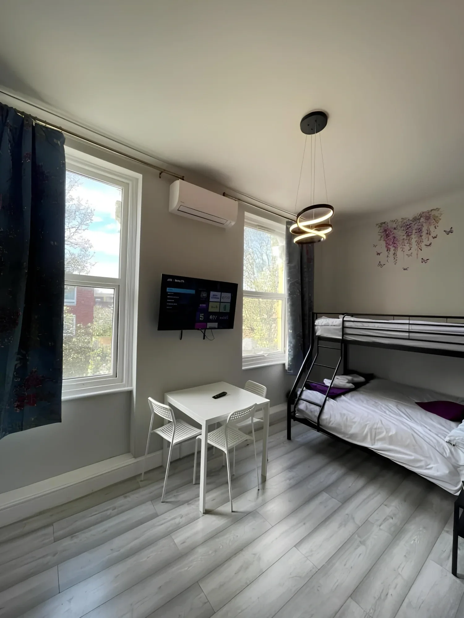 Bed and dining table in the room named 2 floor for 3, near train.