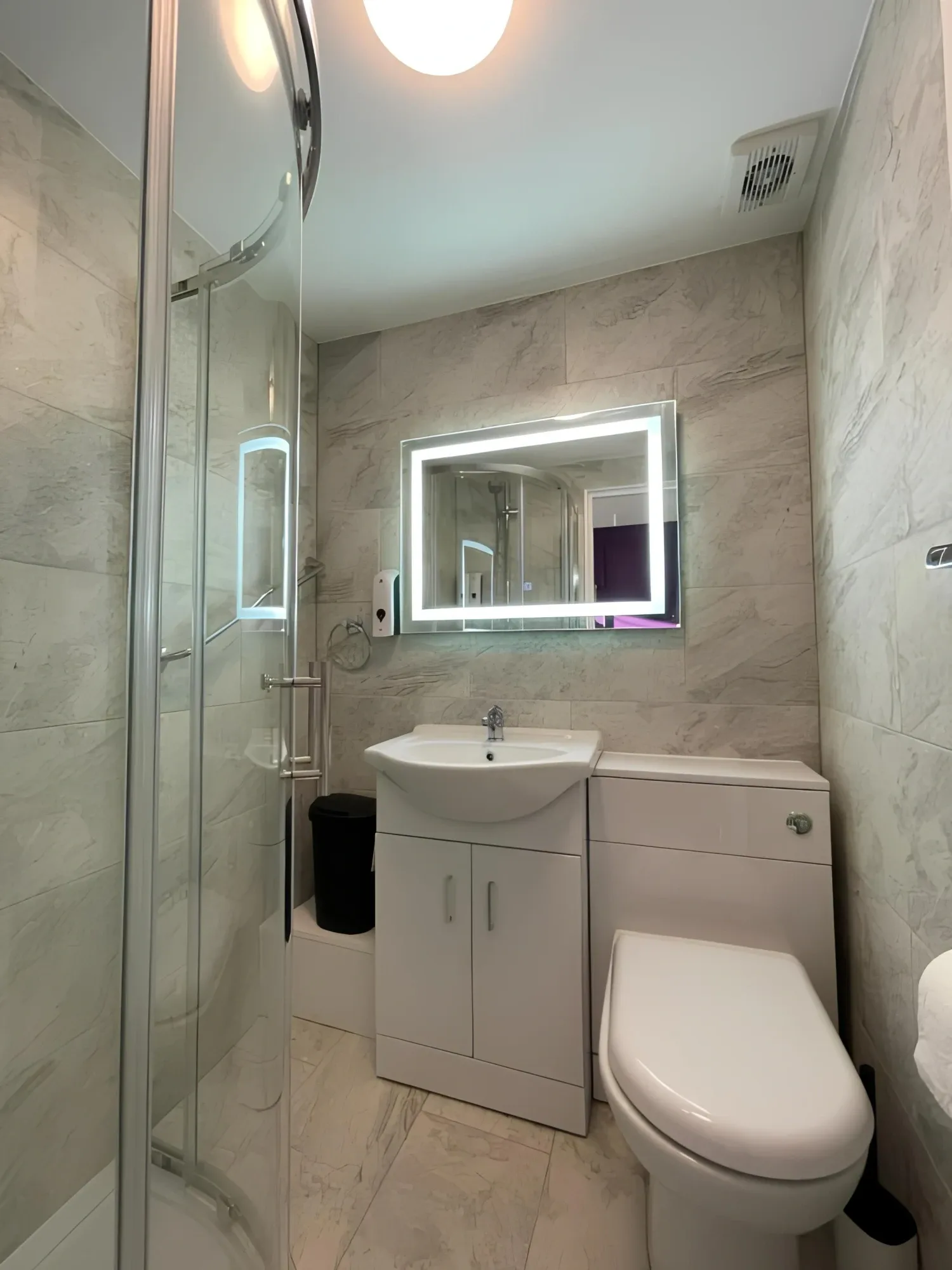 Bathroom in the room named 2 floor for 3, near train.